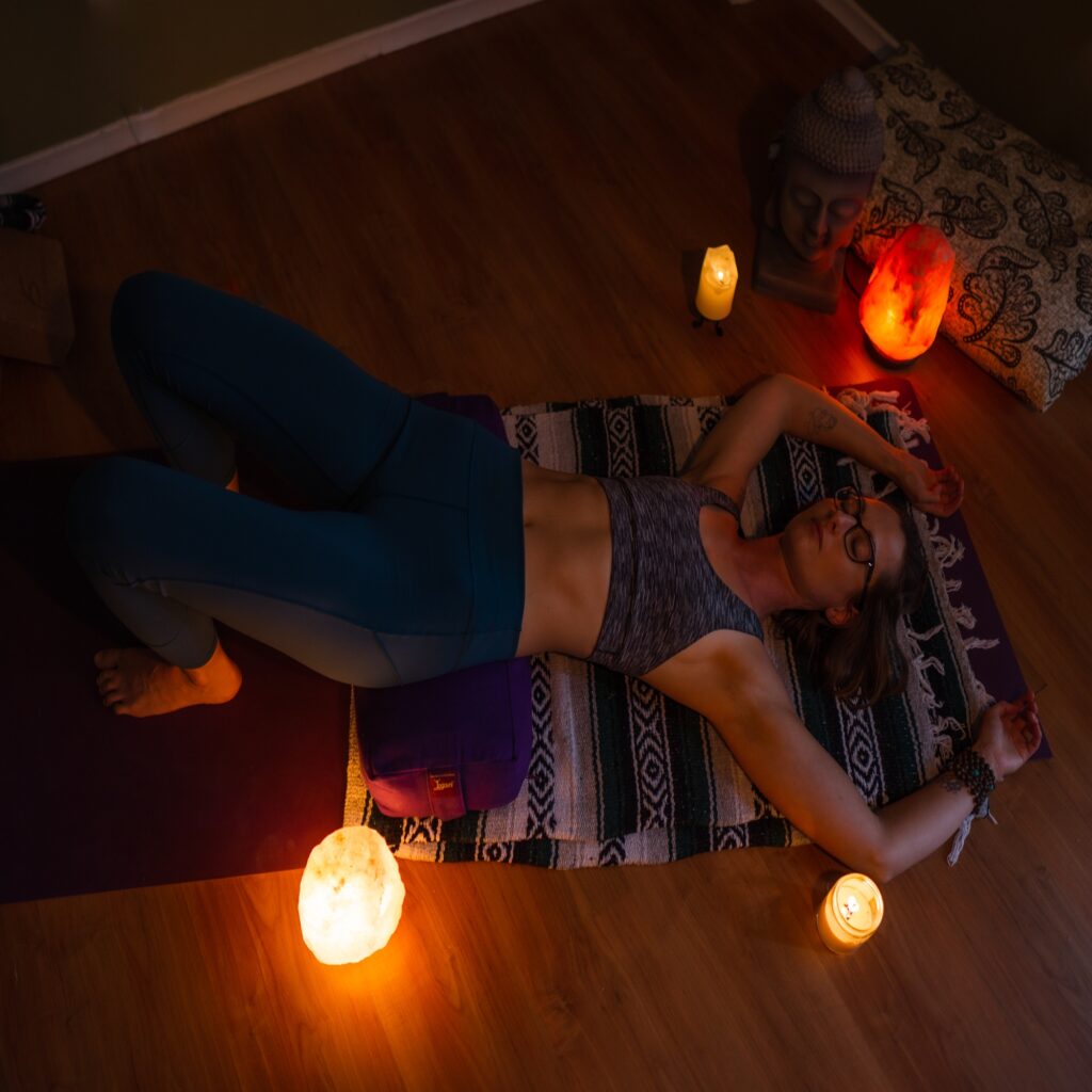 Carole Carter from Living Lotus Online demonstrating restorative bridge pose