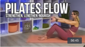 Carole Carter in Living Lotus Online yoga studio demonstrating pilates core exercise