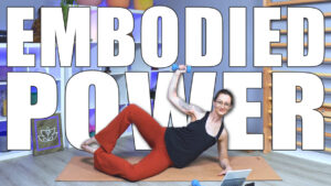 Carole Carter demonstrating HIIT Pilates in the Living Lotus Online studio